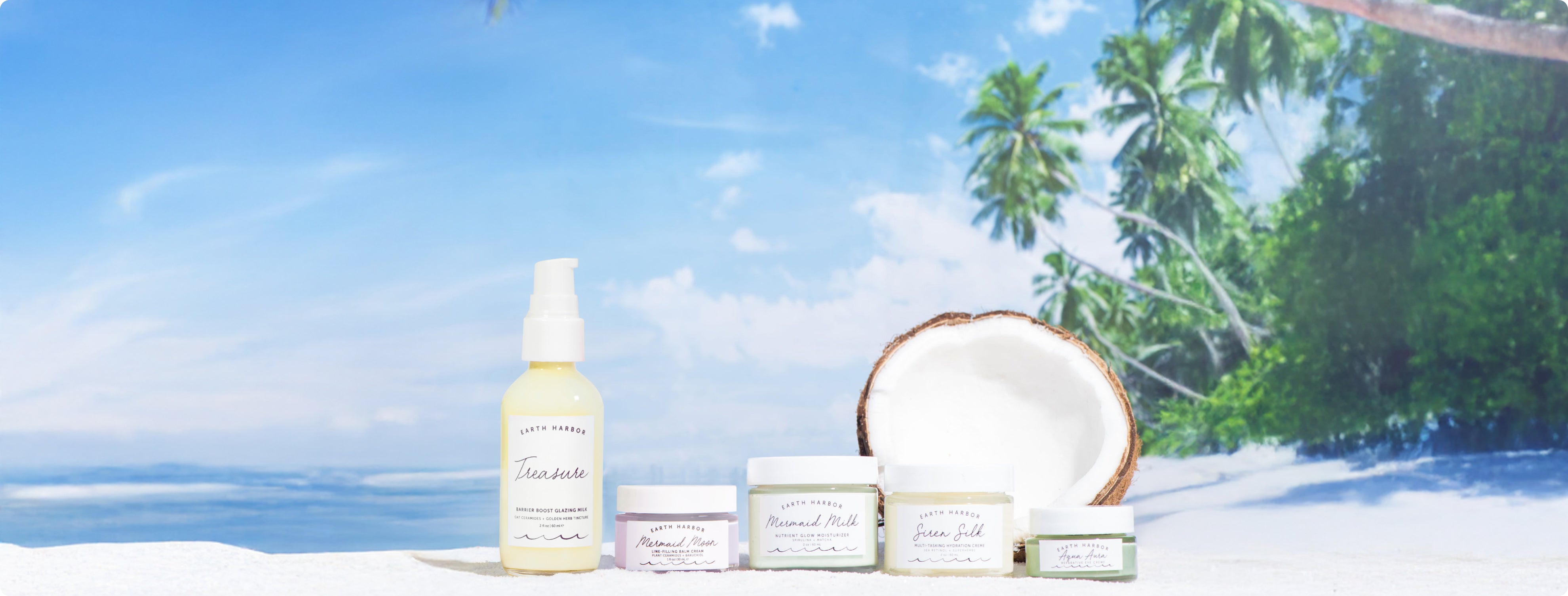 Skincare products displayed on sand with
a coconut and tropical beach background.